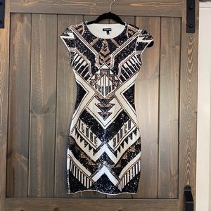 Mini dress with geometric sequins.  XXS